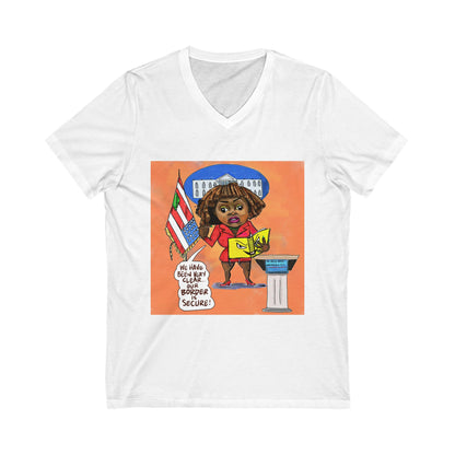 Orange Binder Lady Musobia political satire artwork on white V-neck T-shirt